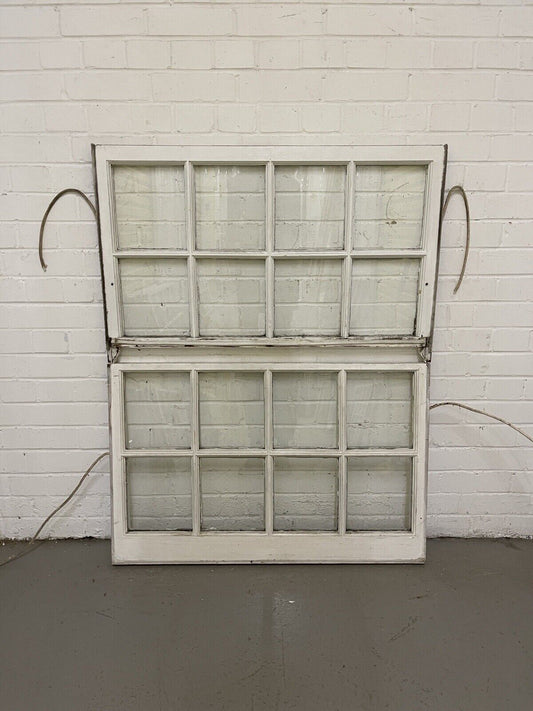 Pair Of Reclaimed Georgian 8 Panel Wooden Panel Sash Window 940x595 940x545