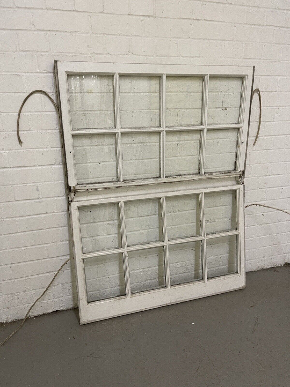 Pair Of Reclaimed Georgian 8 Panel Wooden Panel Sash Window 940x595 940x545